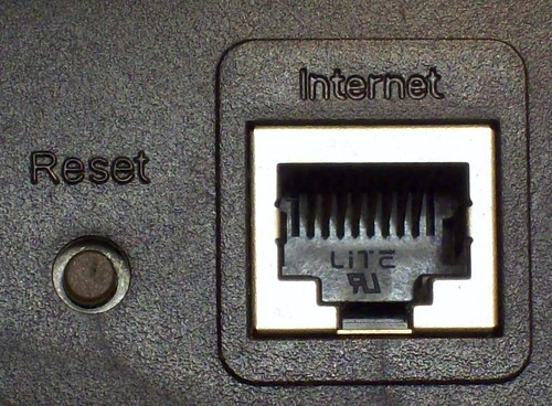Picture of ethernet jack and reset pin hole