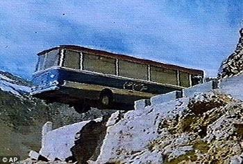 Bus teetering on precipice