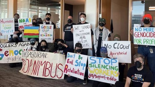 Protesters holding signs critical of Project Nimbus